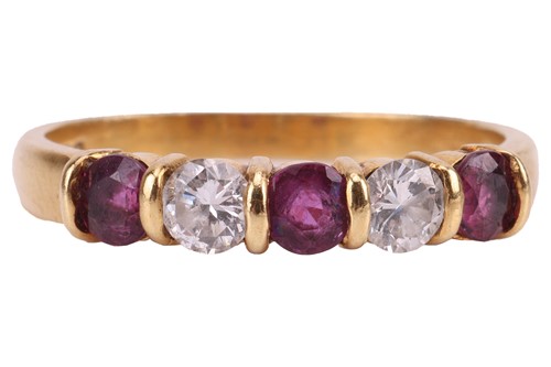 Lot 114 - A ruby and diamond-set half-eternity ring,...