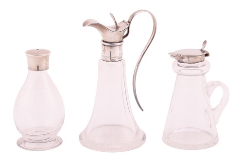 Lot 338 - An Edwardian glass and silver-mounted whiskey...