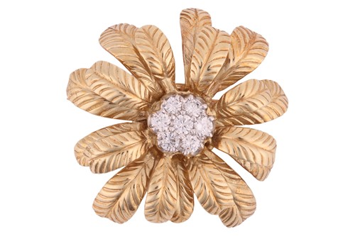 Lot 64 - A diamond-set floral brooch, the flower in...