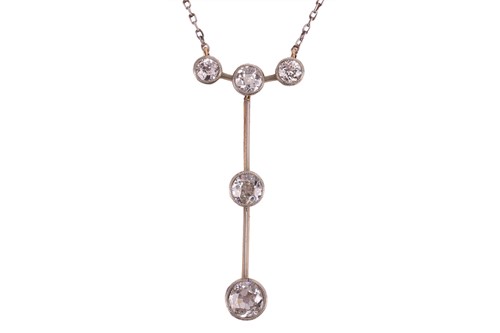 Lot 224 - An Edwardian five stone diamond pendant;...