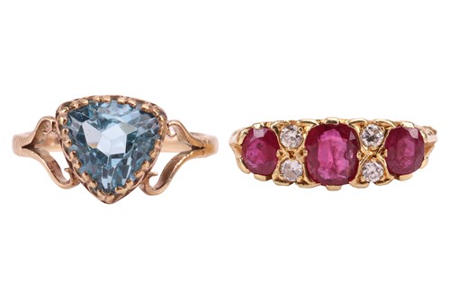 Lot 163 - A ruby and diamond-set half-hoop ring,...