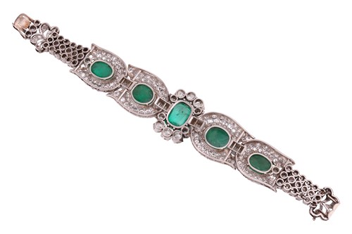 Lot 230 - A mid-20th Century emerald and diamond...