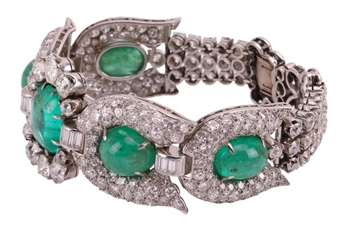 Lot 230 - A mid-20th Century emerald and diamond...