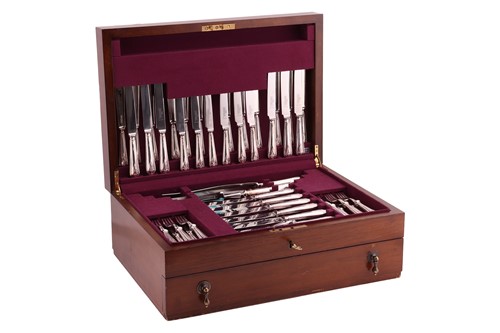 Lot 335 - Harrods. A silver canteen for twelve people in...