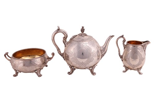 Lot 358 - A Victorian three-piece tea set; circular with...