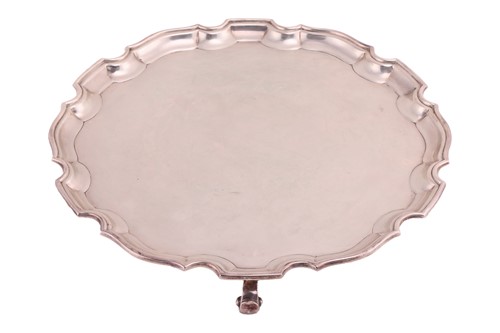 Lot 357 - A silver pie crust edge salver by Adie...