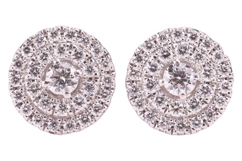 Lot 66 - A pair of diamond cluster earrings in 18ct...