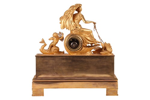 Lot 124 - A French Empire gilt bronze clock, depicting...