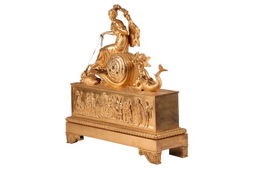 Lot 124 - A French Empire gilt bronze clock, depicting...