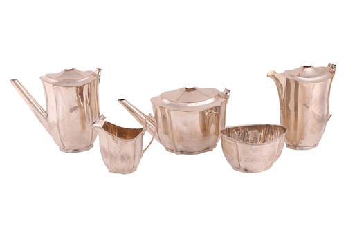 Lot 323 - A silver five-piece tea service, of shaped...