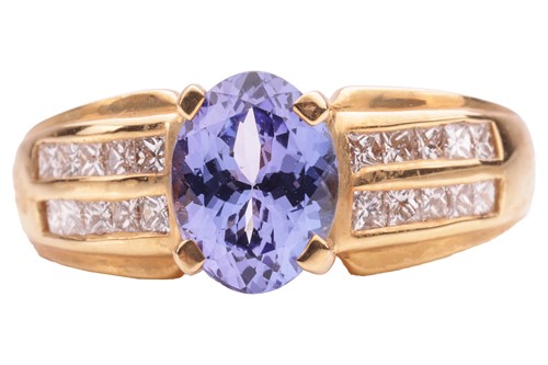 Lot 155 - A diamond and tanzanite dress ring by Iliana,...