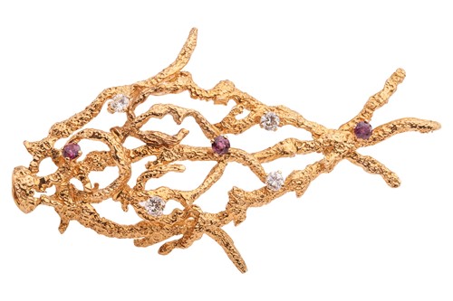 Lot 204 - A diamond and ruby brooch; the stylised...