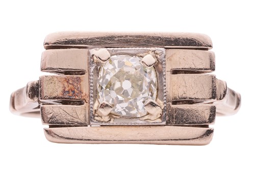 Lot 69 - A diamond-set dress ring, the plaque-style...