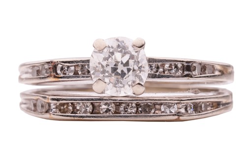 Lot 181 - A diamond-set ring, composed of a split shank...