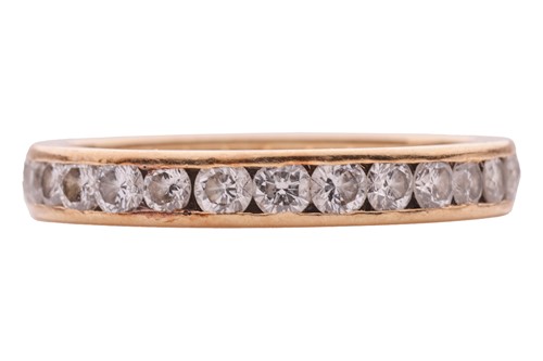 Lot 32 - A diamond-set full eternity ring, comprised of...