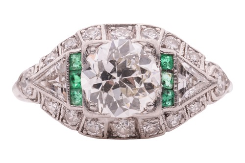 Lot 229 - An Art Deco diamond and emerald dress ring,...