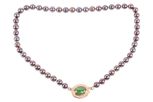 Lot 47 - A single-strand of Tahitian pearls with an...