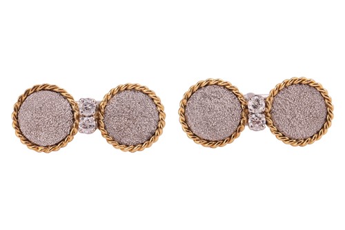 Lot 19 - A pair of two-toned cufflinks, each composed...