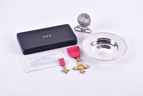 Lot 2 - A gilt metal O.B.E. medal on red ribbon...