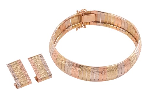 Lot 69 - A tri-colour bracelet and matching earrings;...