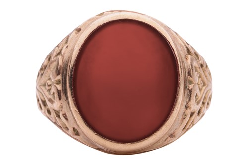 Lot 88 - A carnelian signet ring; the oval ring head...