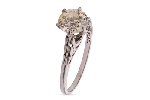 Lot 130 - An old-cut diamond solitaire ring, with an...