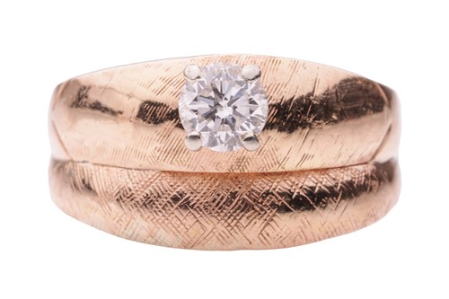 Lot 128 - A contemporary diamond set ring; featuring a...