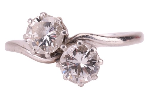 Lot 184 - A diamond Toi et Moi ring; featuring two round...