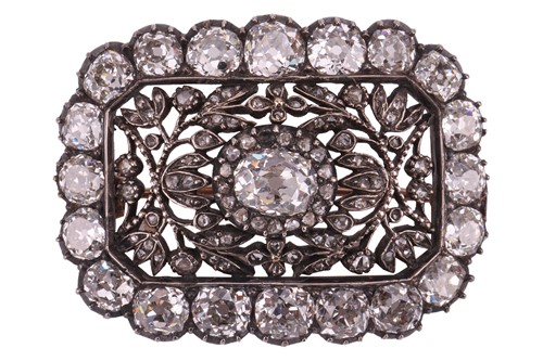 Lot 242 - An old-cut diamond brooch, centred with an...