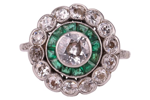 Lot 240 - An Art Deco diamond and emerald target ring,...