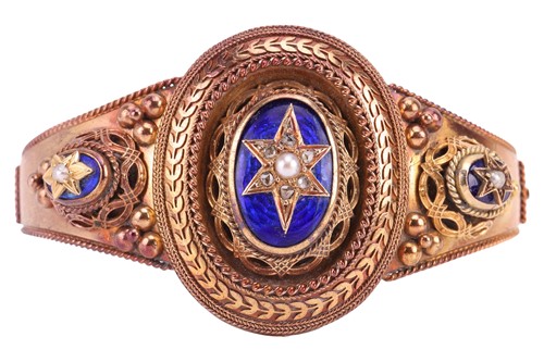 Lot 95 - A Victorian gem-set enamel hinged bangle, the...