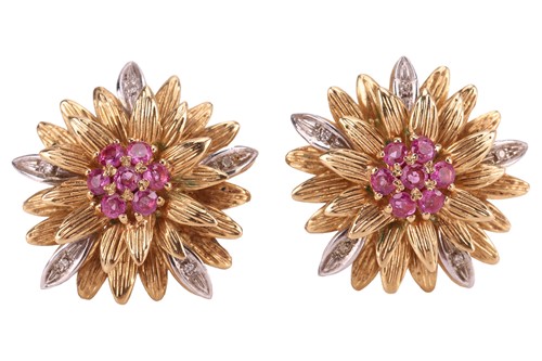Lot 21 - A pair of ruby-set floral clip-on earrings,...