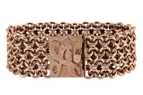 Lot 208 - A wide Bismarck link bracelet in 9ct yellow...