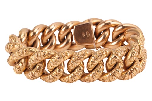 Lot 155 - An embossed curb link bracelet, comprising a...