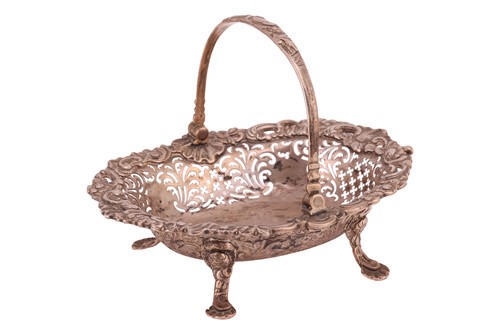 Lot 323 - A George II silver sweetmeat basket London...