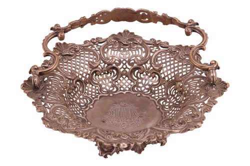 Lot 320 - A George II silver sweetmeat basket of shaped...