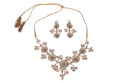 Lot 181 - A gilt floral necklace with matching earrings...
