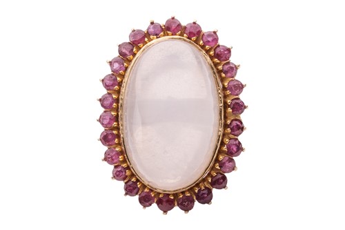 Lot 70 - A cat's eye moonstone and ruby cocktail ring,...