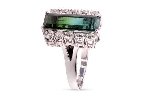 Lot 90 - A bi-colour tourmaline and diamond dress ring,...