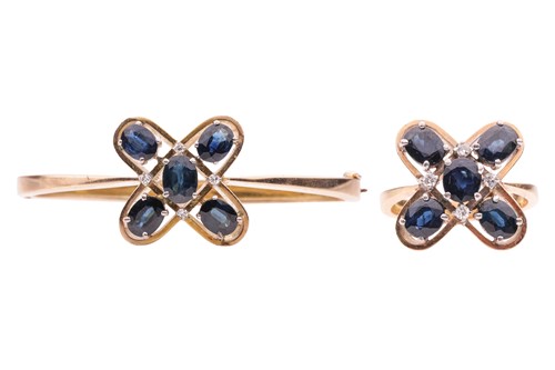 Lot 105 - A sapphire-set bangle and matching ring, of...