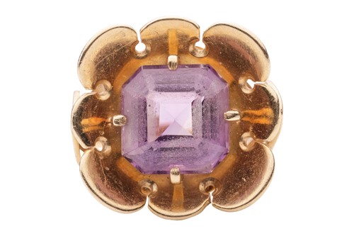 Lot 58 - An amethyst dress ring, of modernist design,...