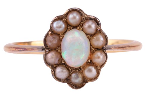 Lot 146 - An opal & pearl cluster ring; featuring a...