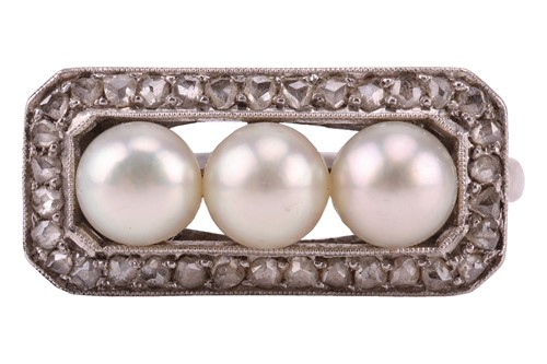 Lot 63 - An early 20th Century pearl trilogy ring; the...