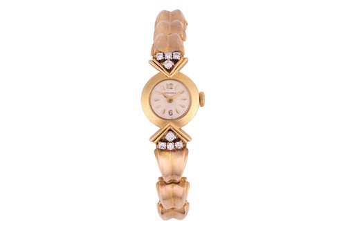 Lot 259 - Longines A Gold and Diamond-set Cocktail Watch...
