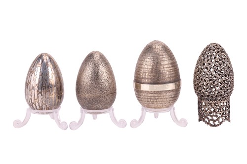 Lot 317 - Stuart Devlin: four silver eggs of varying...