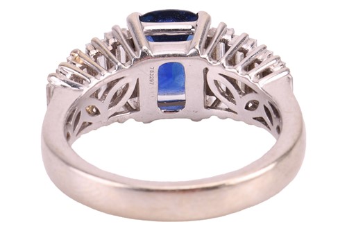 Lot 105 - A sapphire and diamond ring, comprising a...