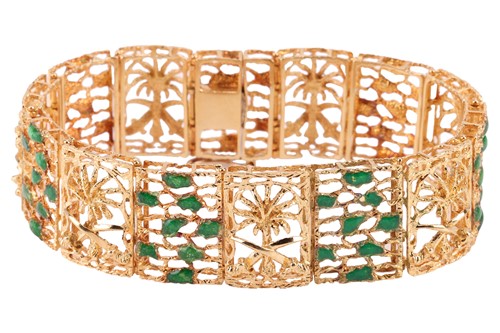 Lot 106 - A Saudi Arabian panel link bracelet, the...