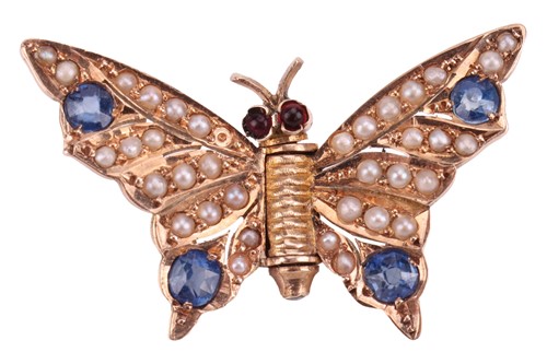 Lot 97 - René Boivin - a gem-set butterfly clip brooch,...