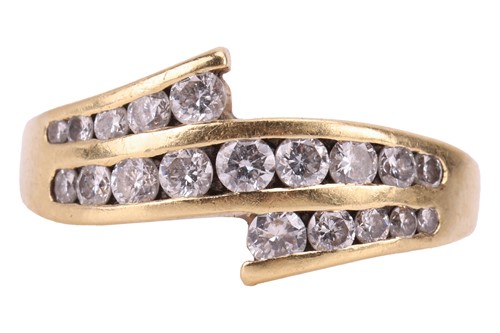 Lot 32 - An 18ct gold diamond-set ring, comprising a...