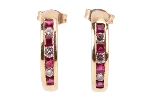 Lot 67 - A pair of ruby and diamond half hoop earrings,...
